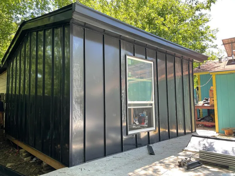 Black standing seam metal wall panels for Roof Inspection in Sterling Heights