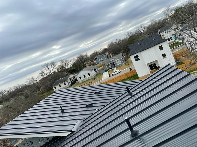 Standing seam metal roof panels with vents for Skylight Repair in Sterling Heights